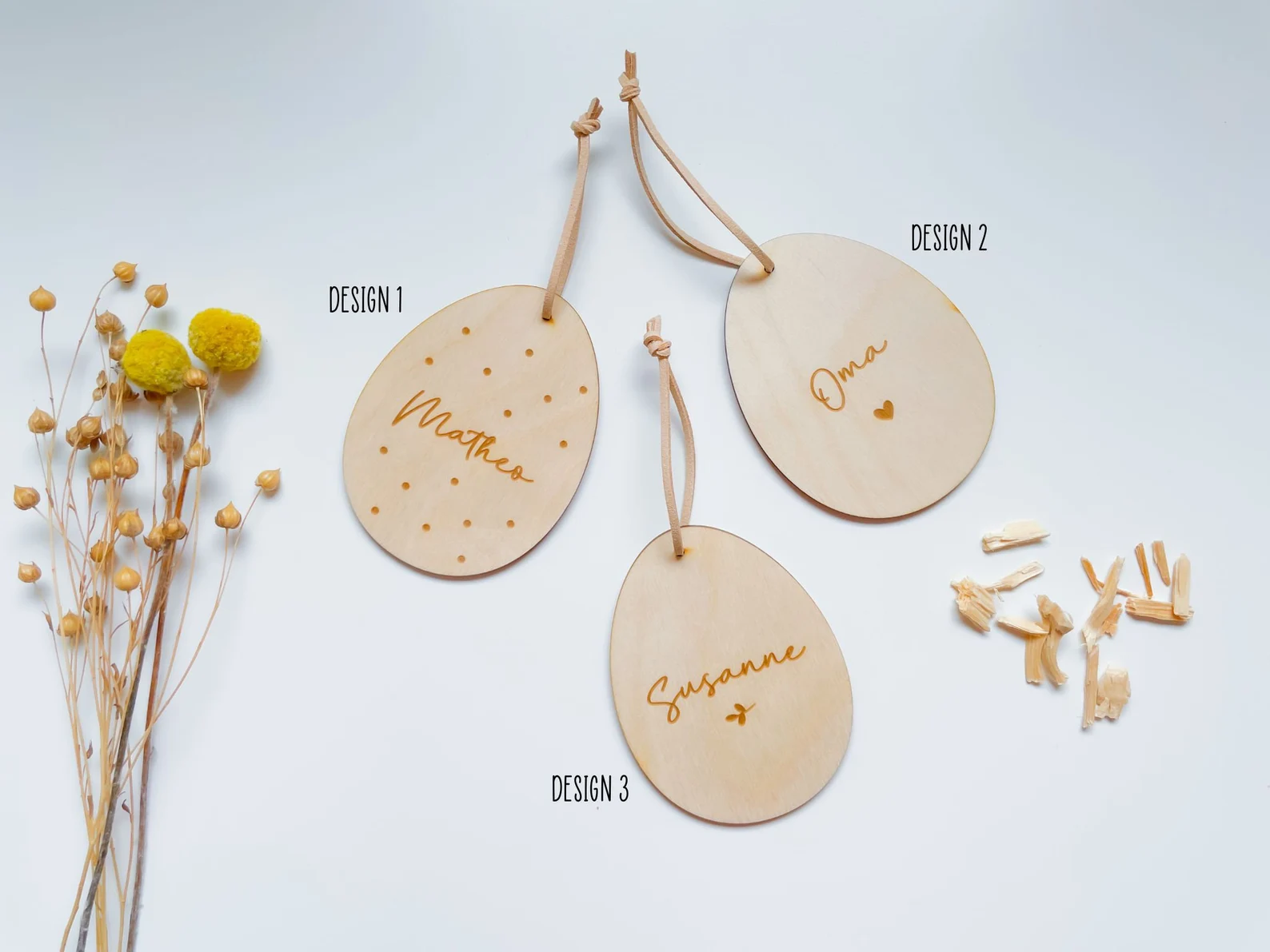 Personalisierte Osteranhänger mit Namen aus Holz Osteranhänger mit Gravur in Eiform und Hasenform