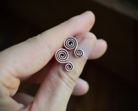 feine Ohrstecker aus Kupfer mit Doppelspiralen im keltischen Stil 10