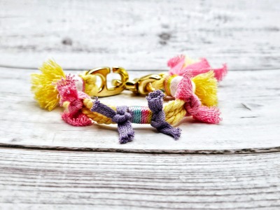 Verspieltes Baumwolltau-Armband in pastellgelb und Rainbow