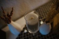 handgemachte Kerze im Sektglas