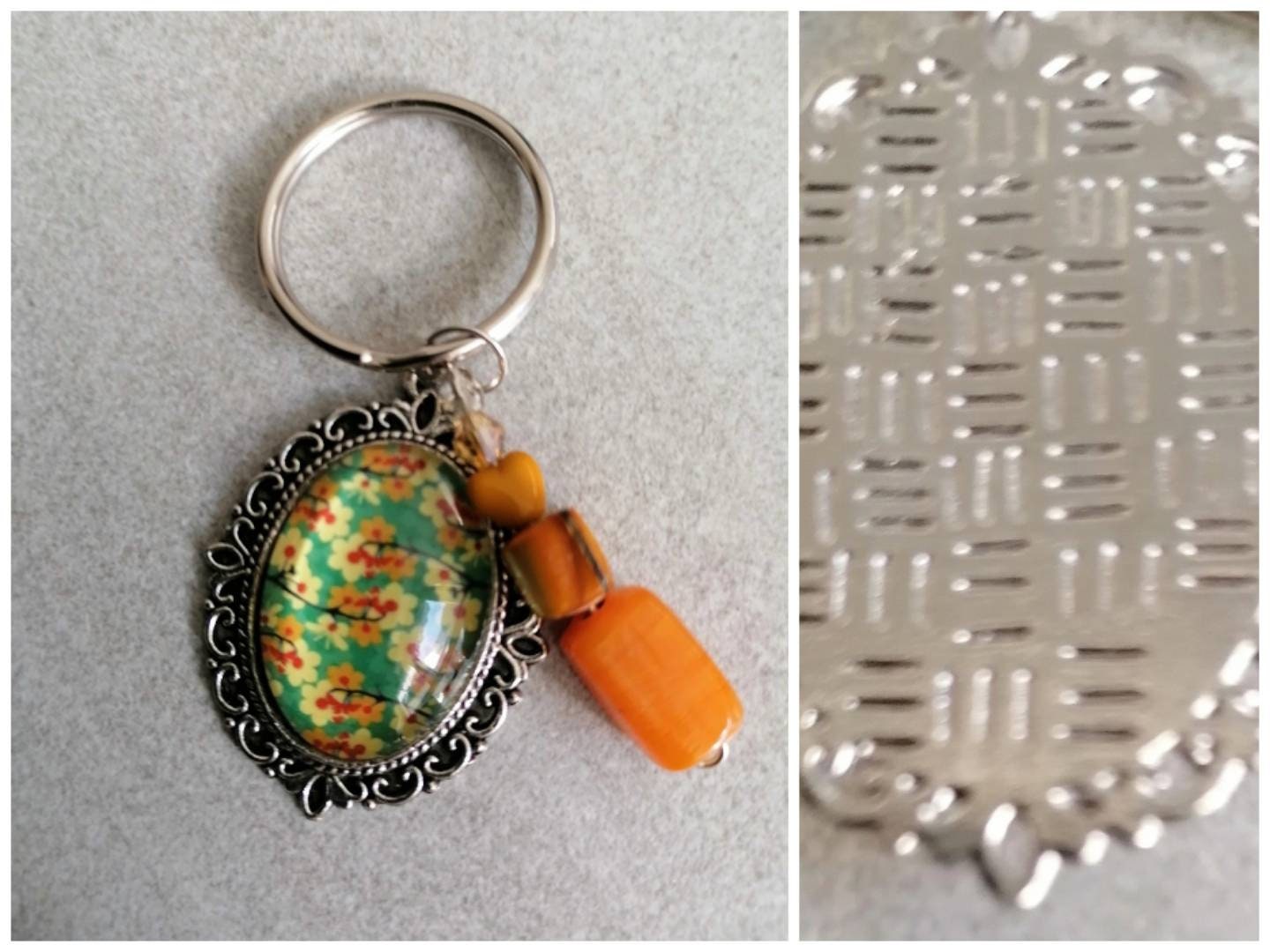 Schlüsselanhänger mit Perlen und Amulett silberfarben 5