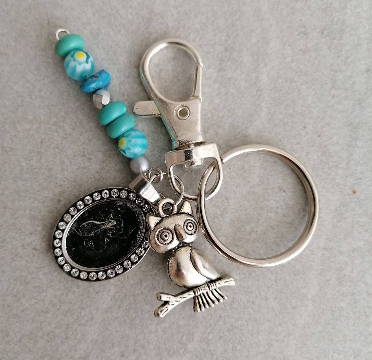 Schlüsselanhänger Eule mit Perlen Karabiner Charm und Amulett silberfarben oder schwarz