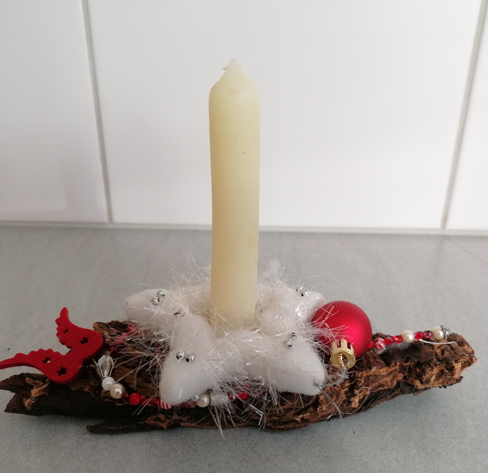 Adventsgesteck mit Kerze