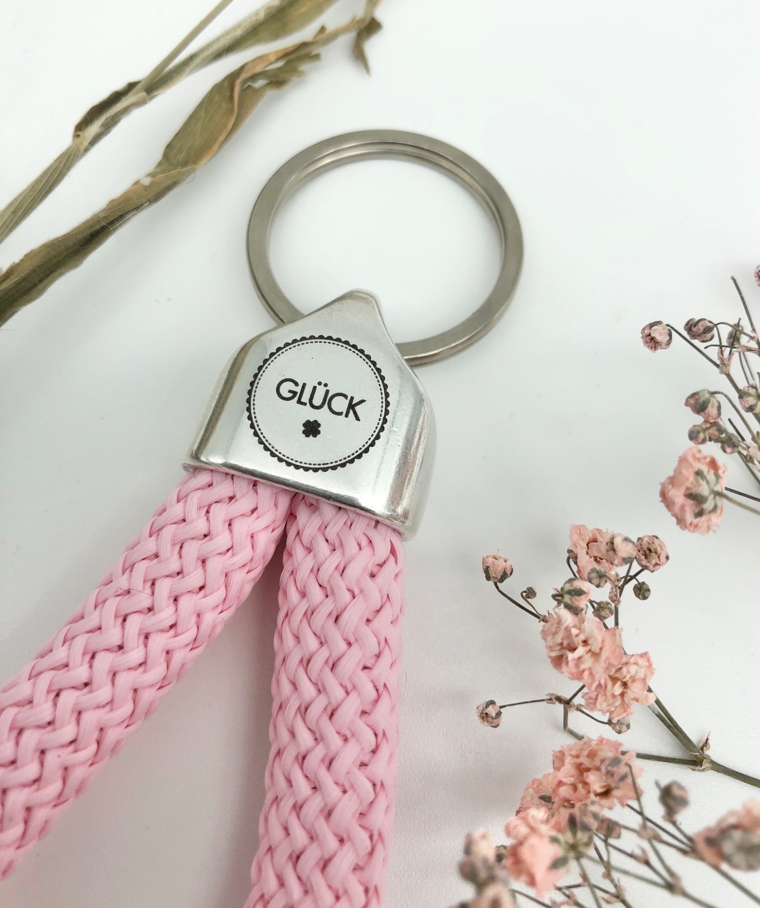 Schlüsselanhänger aus Segeltau Segelseil in rosa mit graviertem Schriftzug Glück