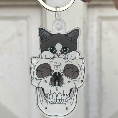 Tuxedo kitty and skull keychain