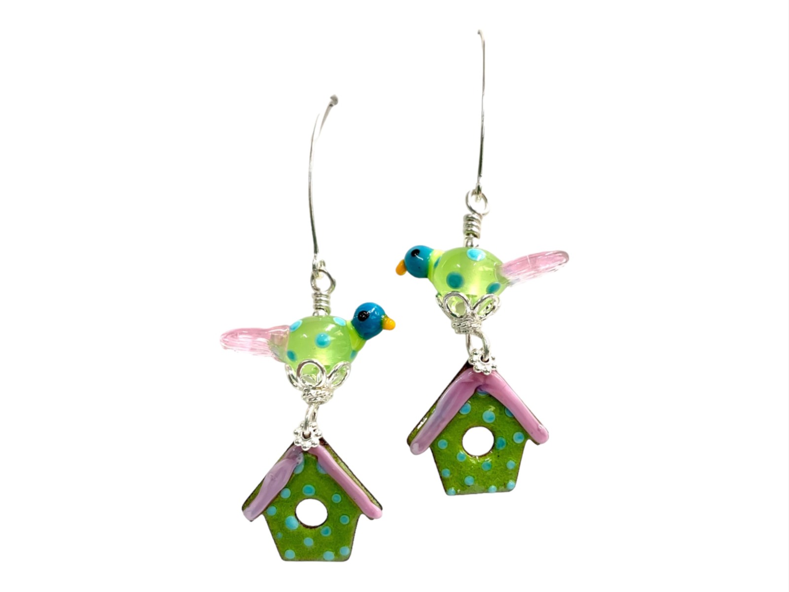 Playful and whimsical Earrings, consistant of a little glass bird and a bird house in spring colors