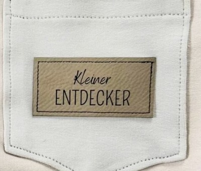 Flexible und weiche Kunstleder-Labels mit kleiner Entdecker Verschiedene Farben und Größen -