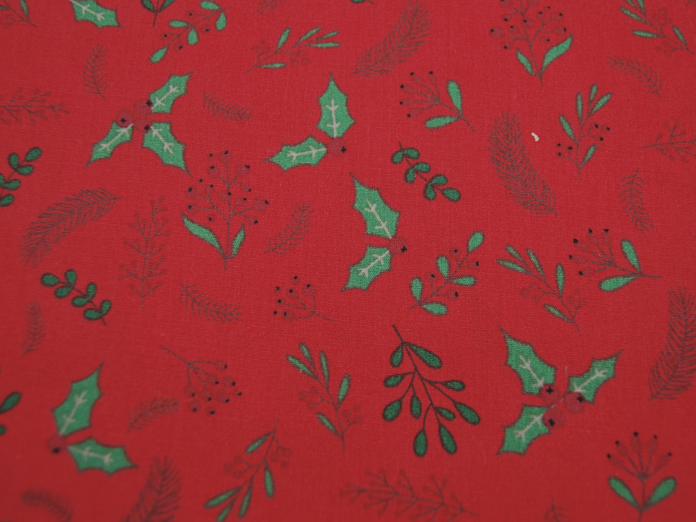 Baumwolle Popeline - Christmas - Mistelzweige und Federn - Motive auf Rot - 0.5m