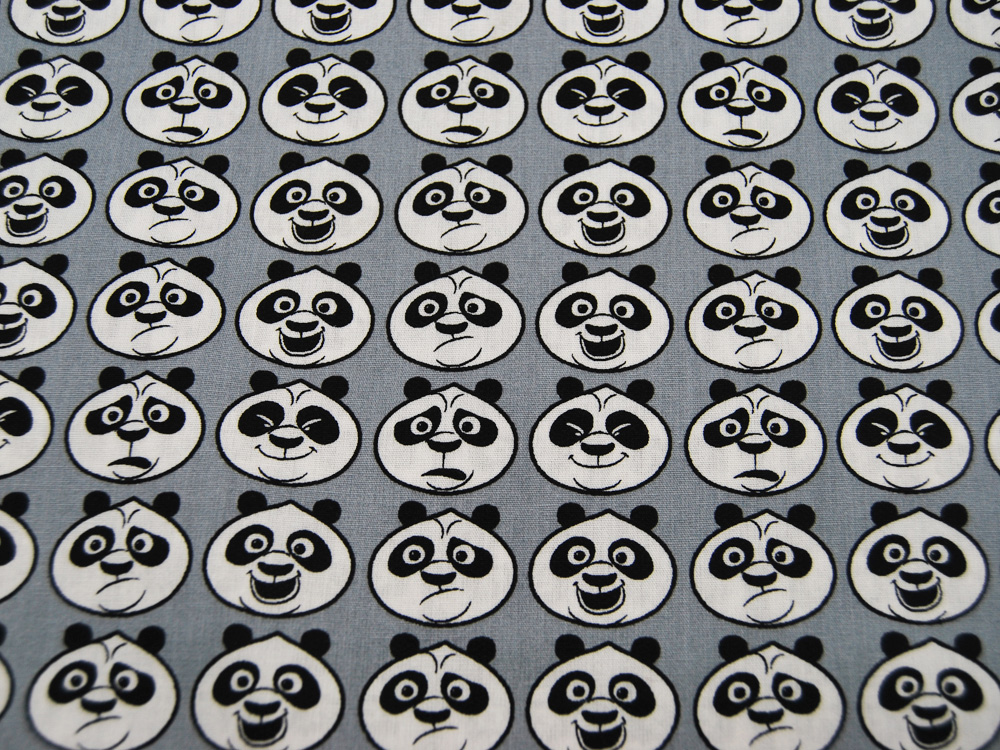 Baumwolle - Kung Fu Panda - Köpfe auf Grau 0,5m 2