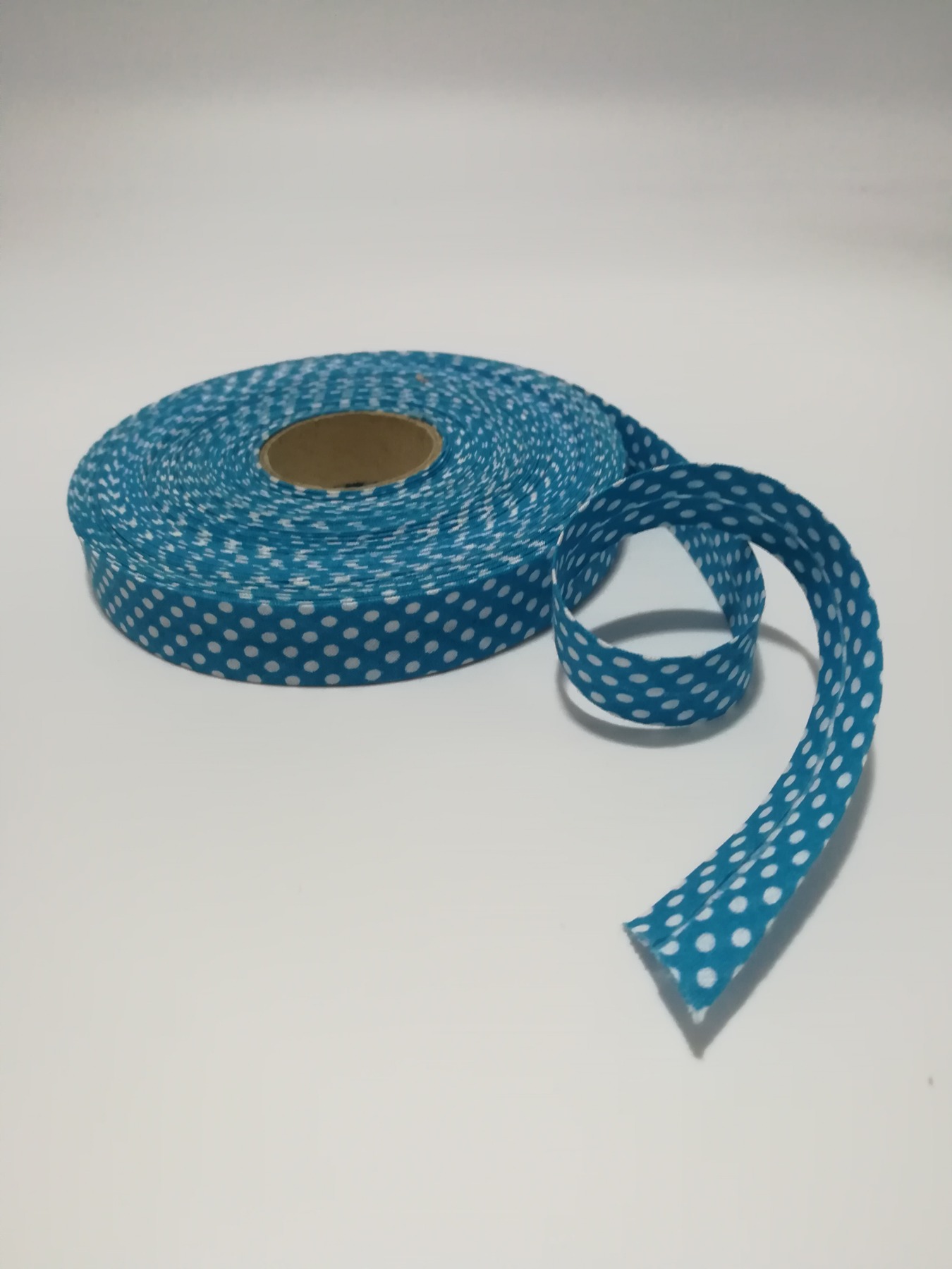 Schrägband 1 Meter in Türkisblau mit weißen Punkten