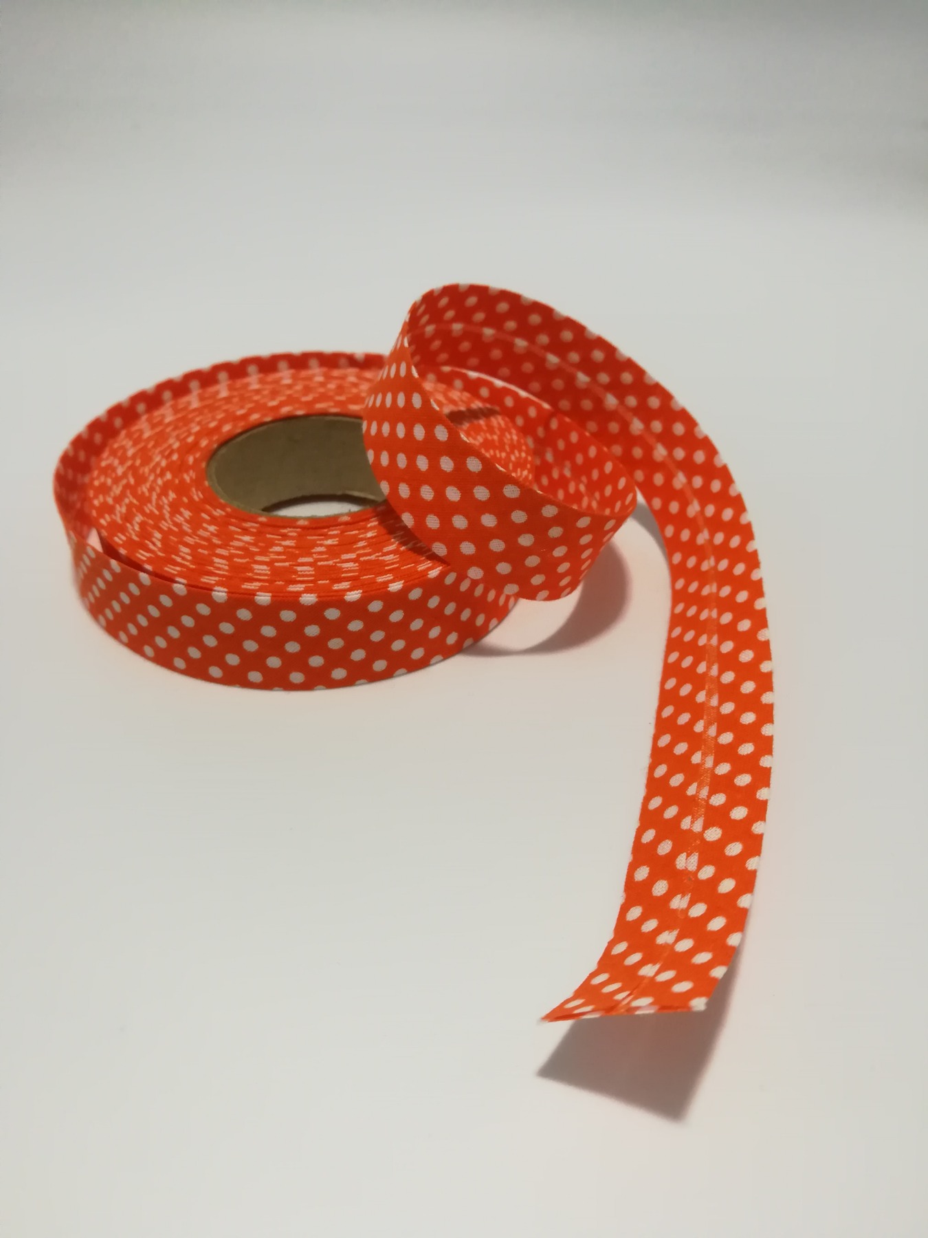 Schrägband 1 Meter in Orange mit weißen Punkten