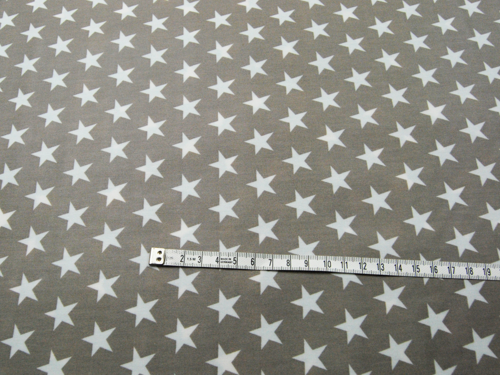 Beschichtete Baumwolle - Sterne auf Beige 50 x 140cm