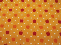 Baumwolle - Werner - Äpfel auf Gelborange - 0,5m 2