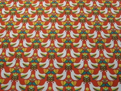 Beschichtete Baumwolle - Vogelmuster auf Rotorange 50 x 145cm