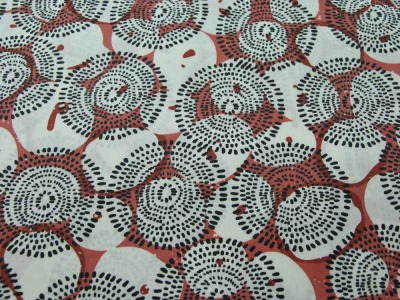 Beschichtete Baumwolle - Graphisches Muster auf Rost 50 x 145cm