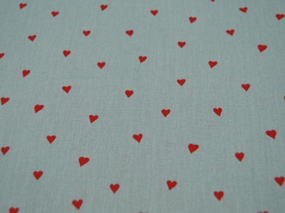 Beschichtete Baumwolle - Herzen - Rot auf Mint - 50 x 145cm