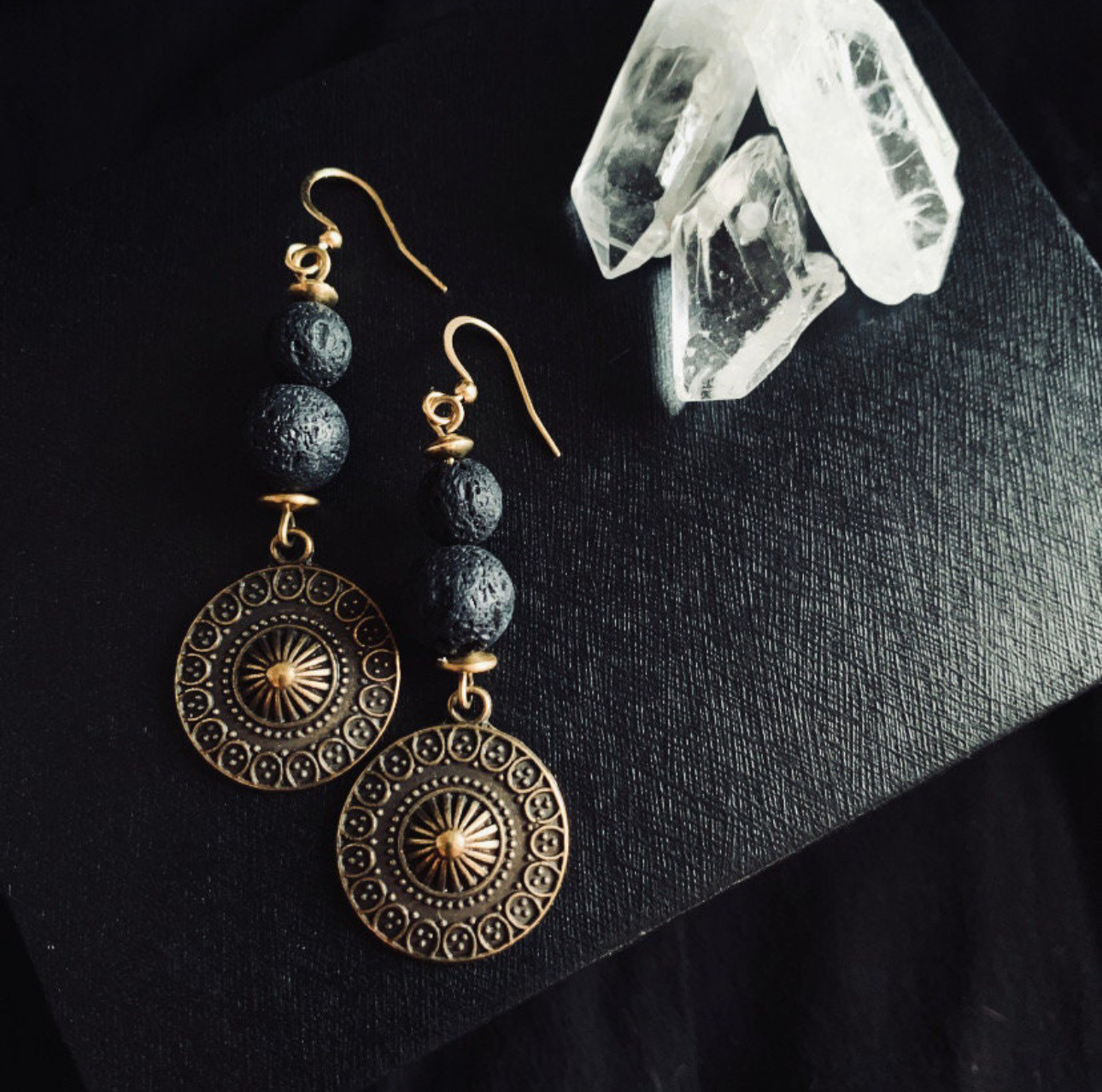 Antique earrings with lava beads, round pendant