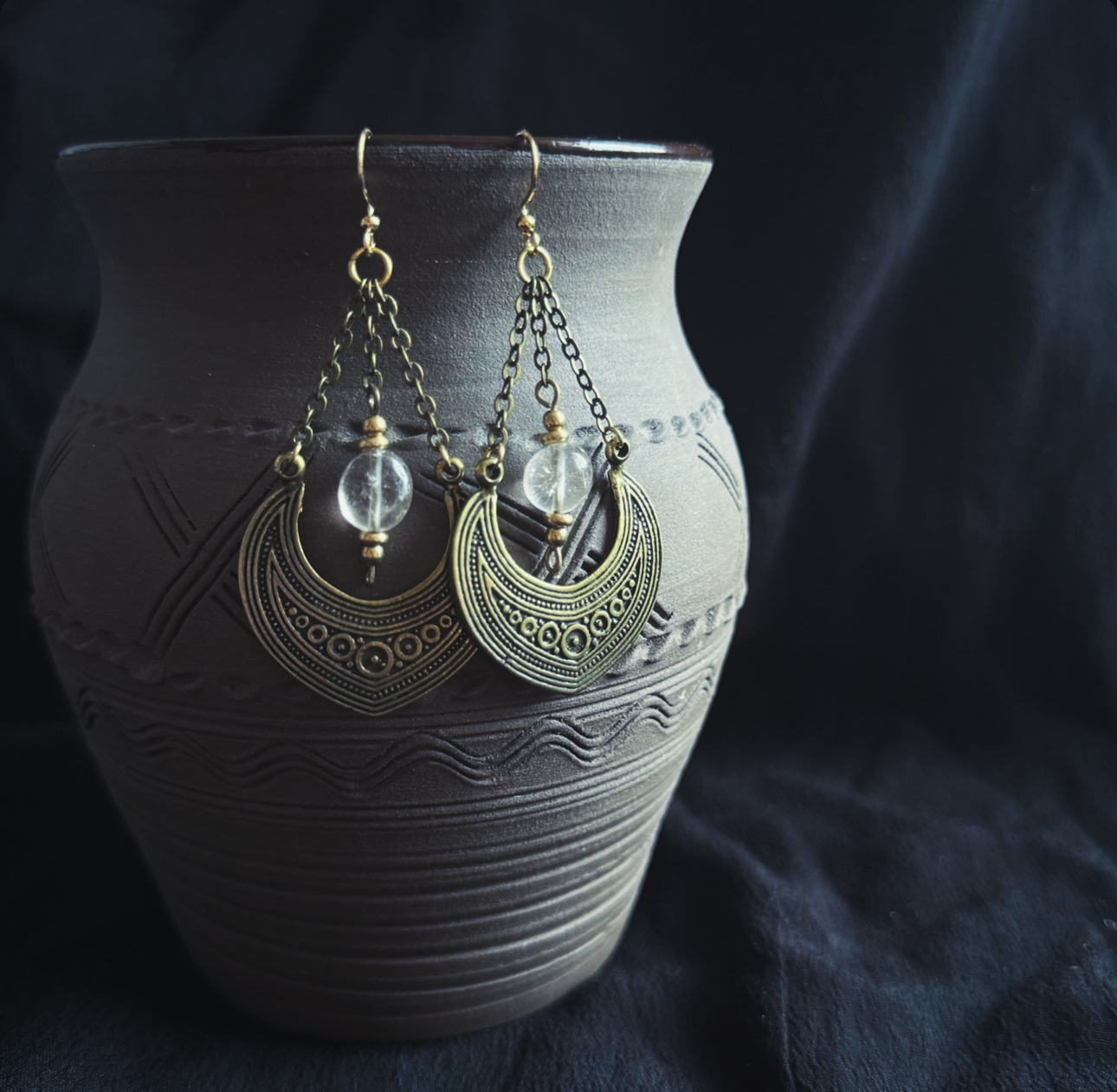 Earrings in an antique look, with rock crystal and bronze