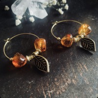 Hoop earrings with leaf pendants