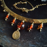 Antique necklace with polished amber and rune pendant 3