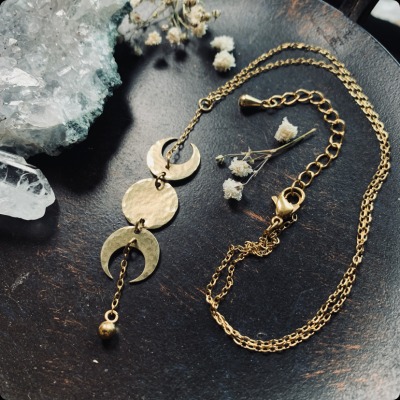 Moon phase necklace made of brass