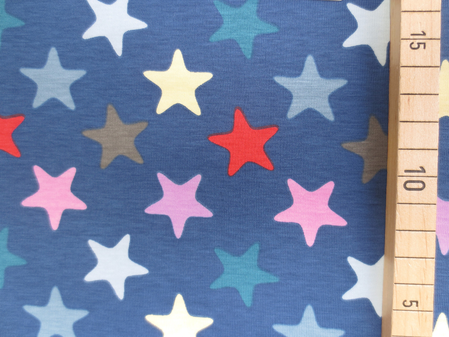 40 cm Reststück - Jersey bunte Sterne - blau - Sternenstoff 2