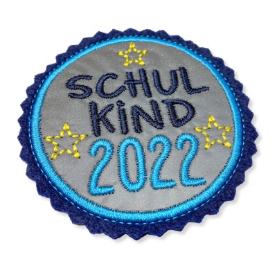 Kletti Schulkind 2022 10cm Durchmesser Reflektorstoff türkis blau Einschulung Schulrucksack