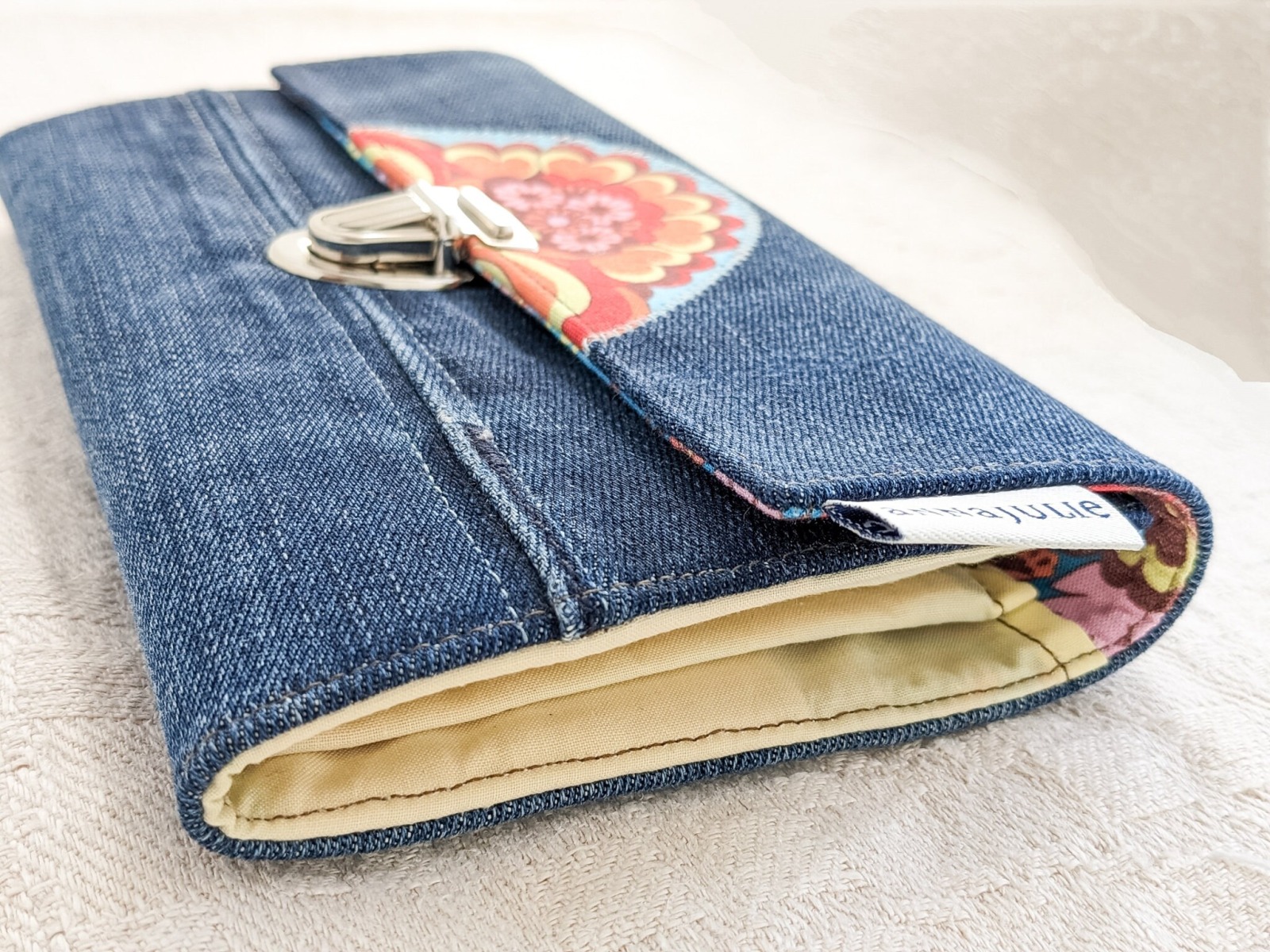 Upcycling wallet | 19 cm/ 7.5 wide | jeans | with floral half rosette | cotton | opulent floral