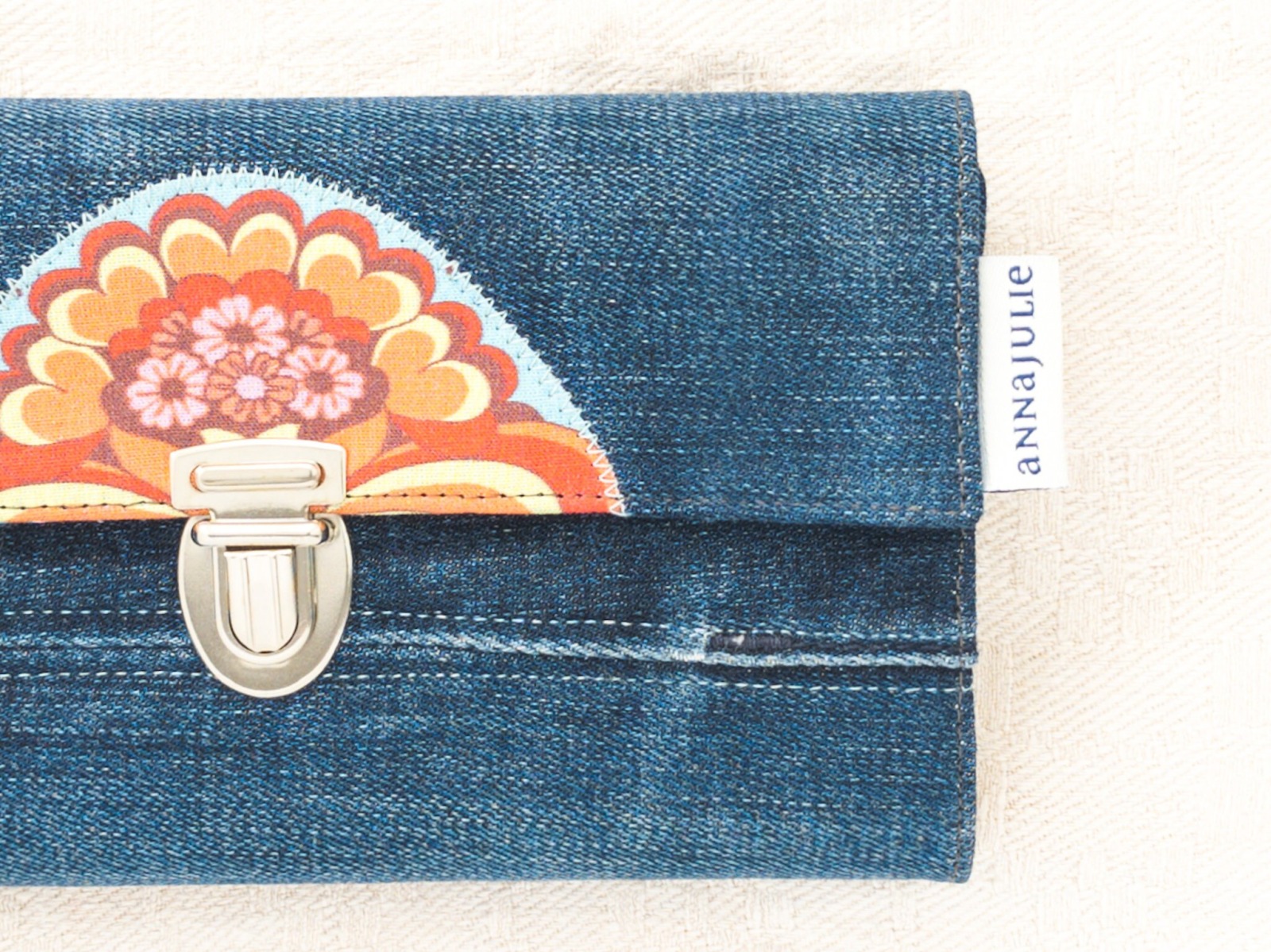 Upcycling wallet | 19 cm/ 7.5 wide | jeans | with floral half rosette | cotton | opulent floral