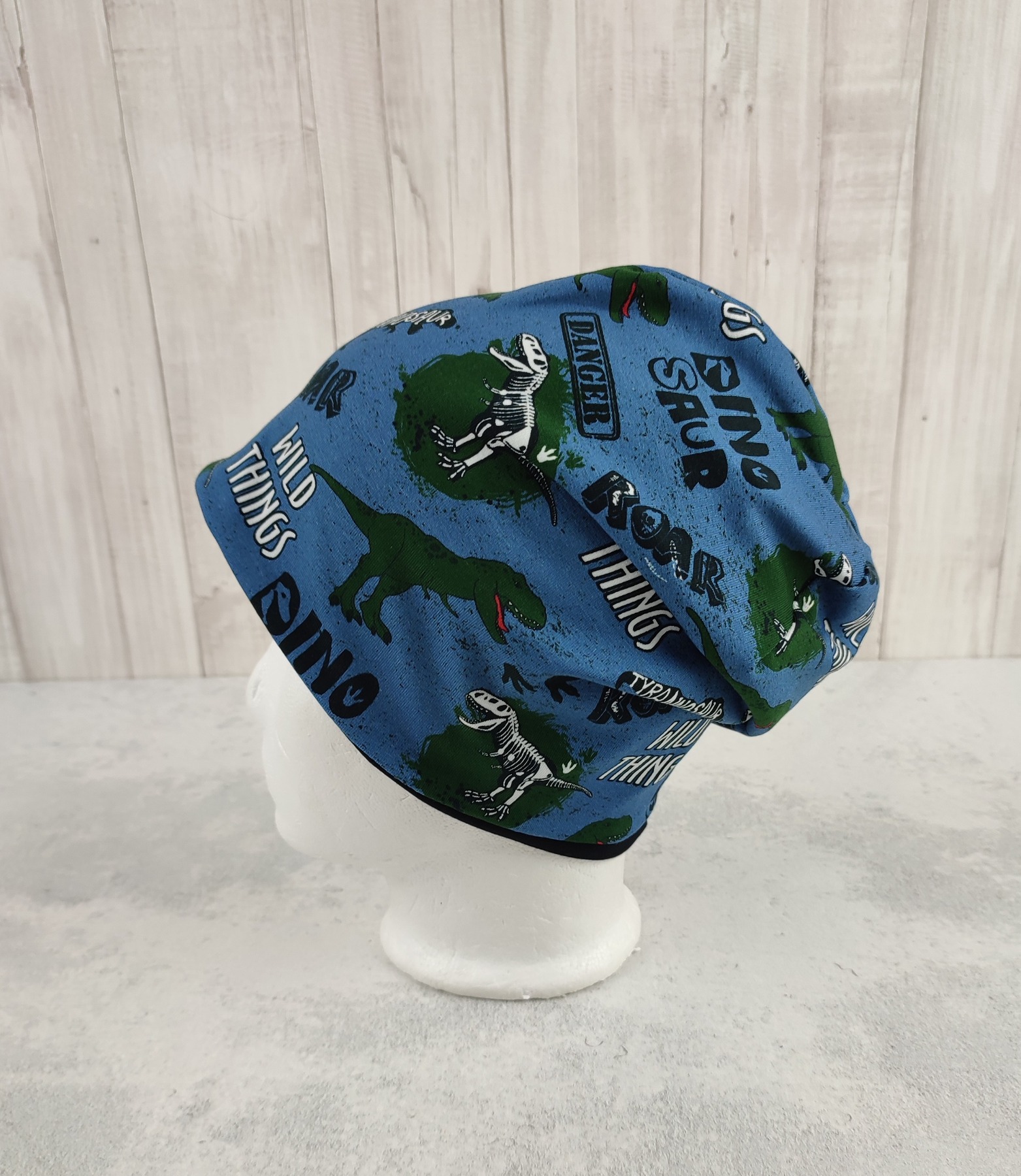 Beanie Dinosaurier - coole Mütze für Kinder mit Dinos auf Jersey in jeansblau Größe ca 48 - 54