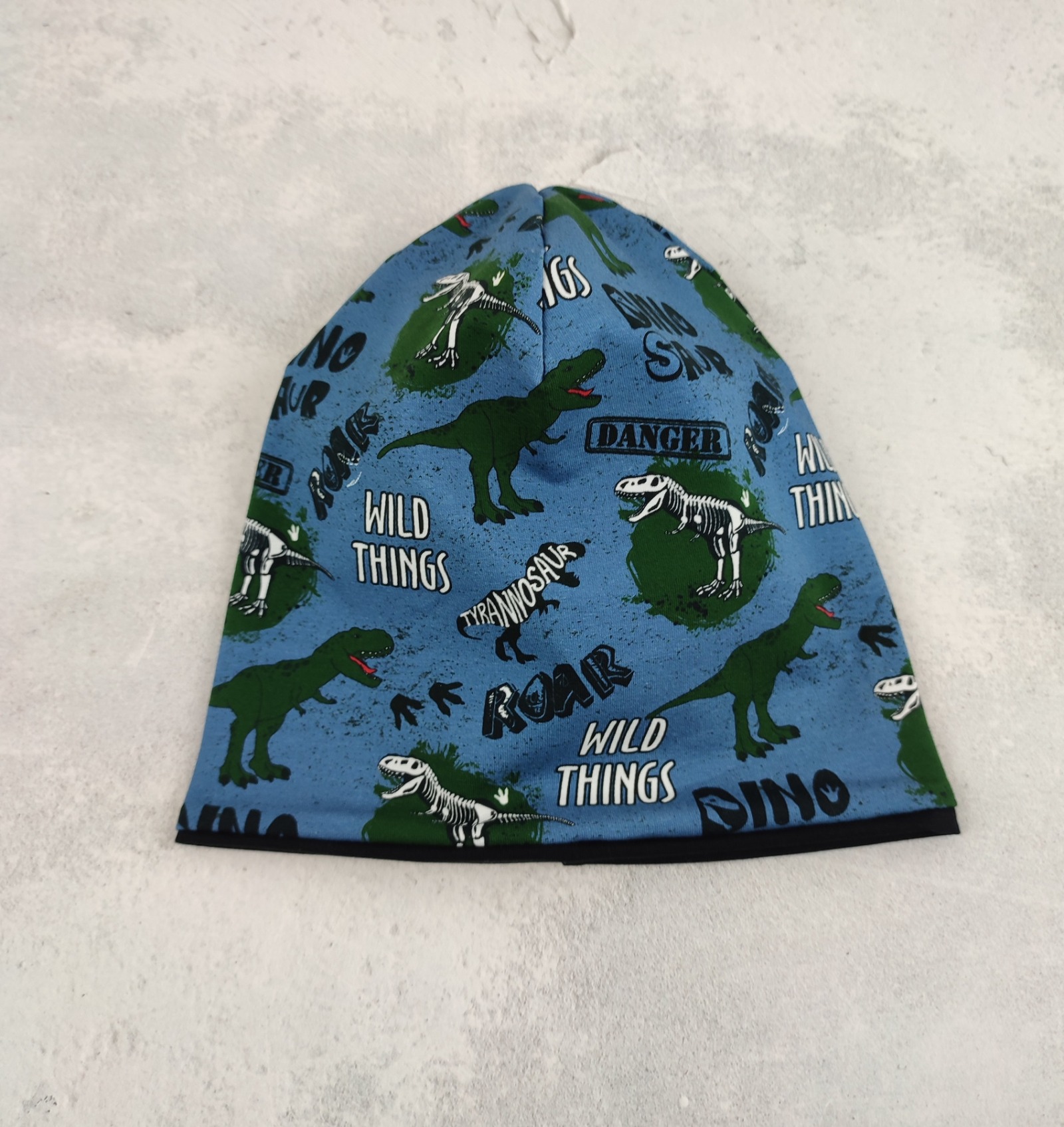 Beanie Dinosaurier - coole Mütze für Kinder mit Dinos auf Jersey in jeansblau Größe ca 48 - 54