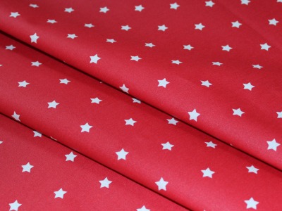 Beschichtete Baumwolle Sterne rot