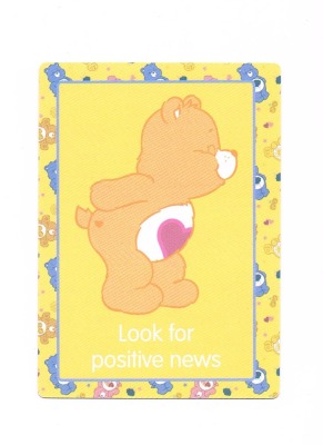 09 looks for positive news - Care Bears - Trading Card