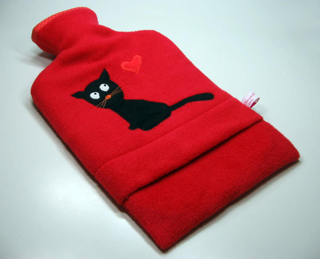 Wärmflasche - Rot mit schwarzer Katze
