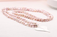 Lange Perlenkette aus echten Süßwasser-Perlen rosè mit einem Herz aus Silber, schönes Geschenk 3