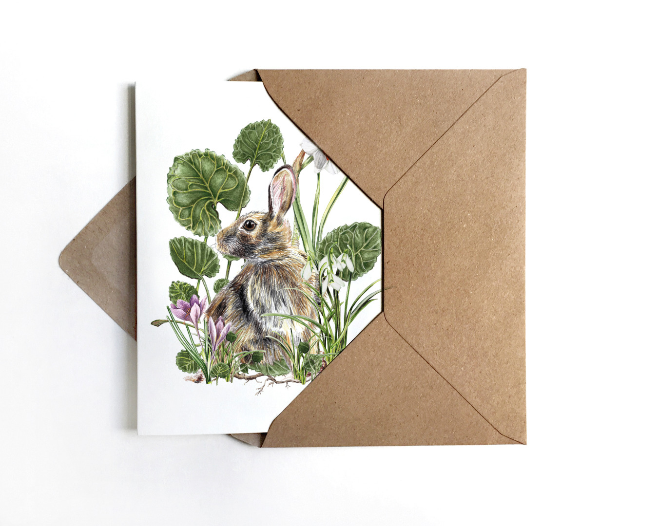 Grußkarte Hase mit Frühjahrsblühern Grußkarte zu Ostern