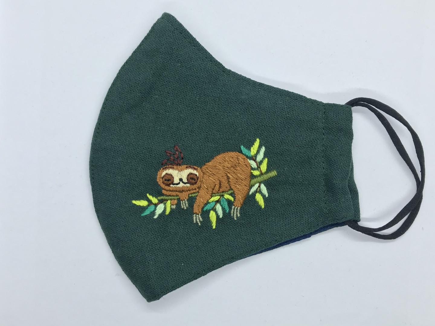 Face mask with sloth hand embroidery