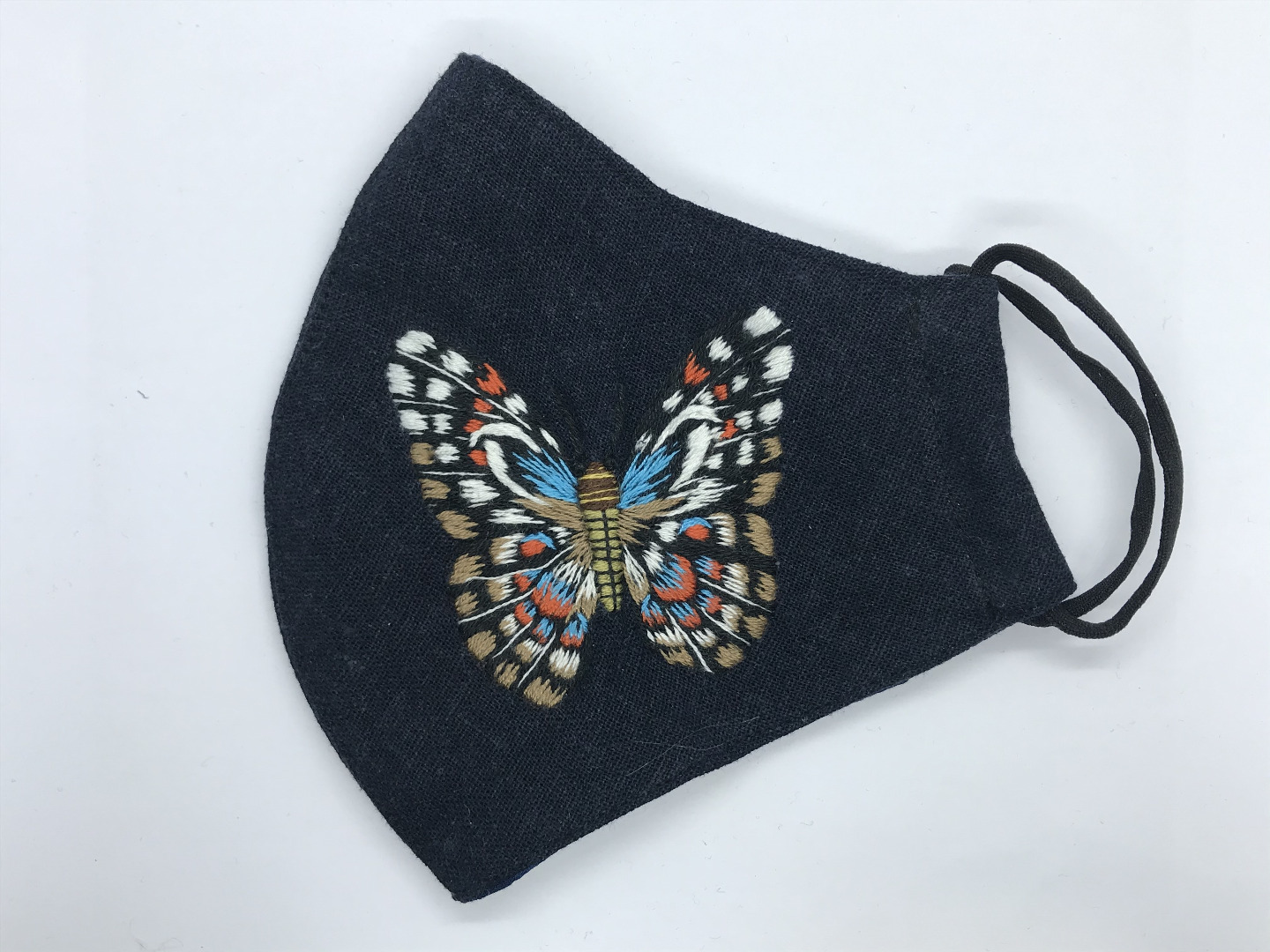 Face mask with butterfly hand embroidery