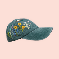 Baseball cap with hand-embroidered sunflower