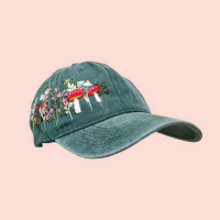 Baseball cap with hand-embroidered wildflower