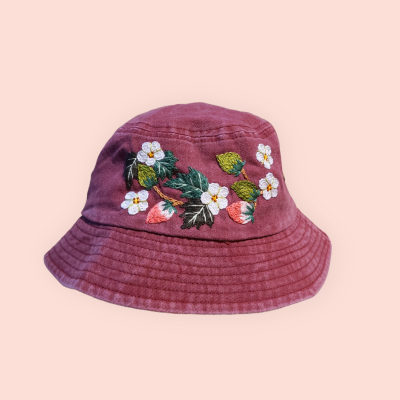Bucket hat with hand-embroidered strawberries
