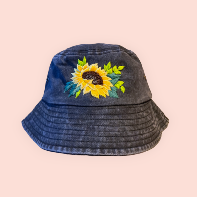 Bucket hat with hand-embroidered sunflower