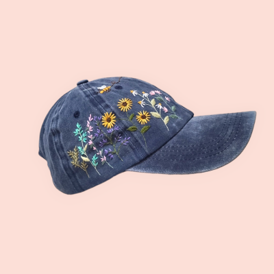 Baseball cap with hand-embroidered sunflower