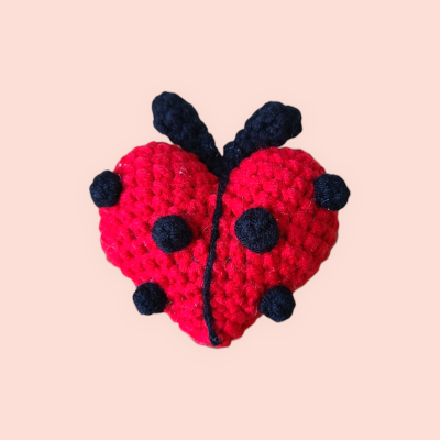 Crocheted lady bug heart