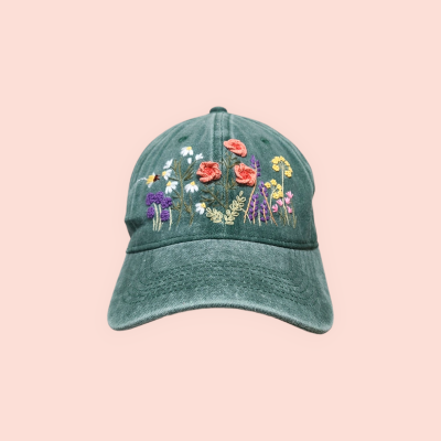 Baseball cap with hand-embroidered wildflower