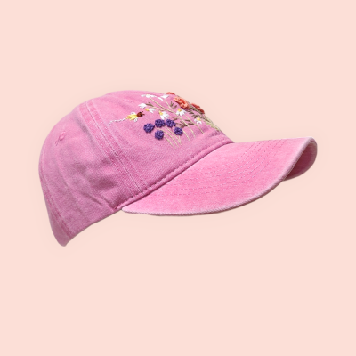 Baseball cap with hand-embroidered wildflower