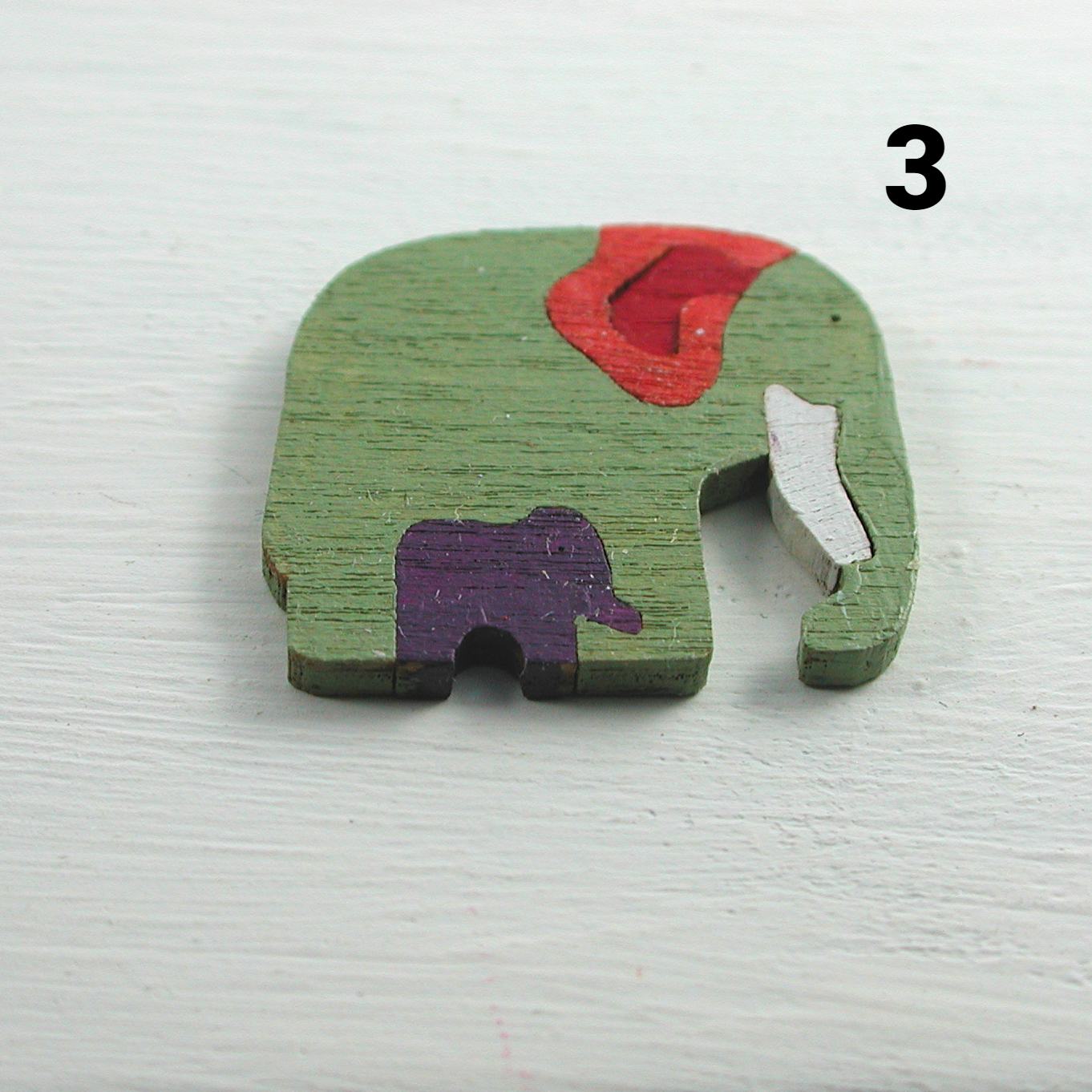 Holzpuzzle Elefant, Ente oder Schildkröte in Miniatur für die Puppenstube