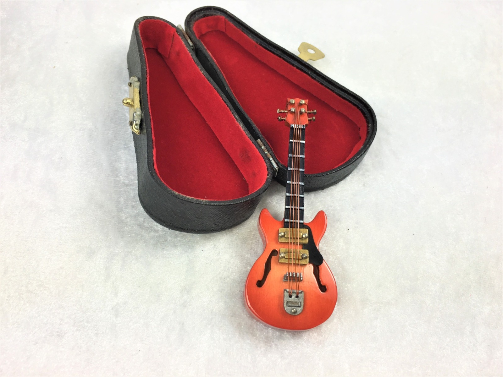 E-Gitarre orange in Miniatur 1:12 mit Koffer