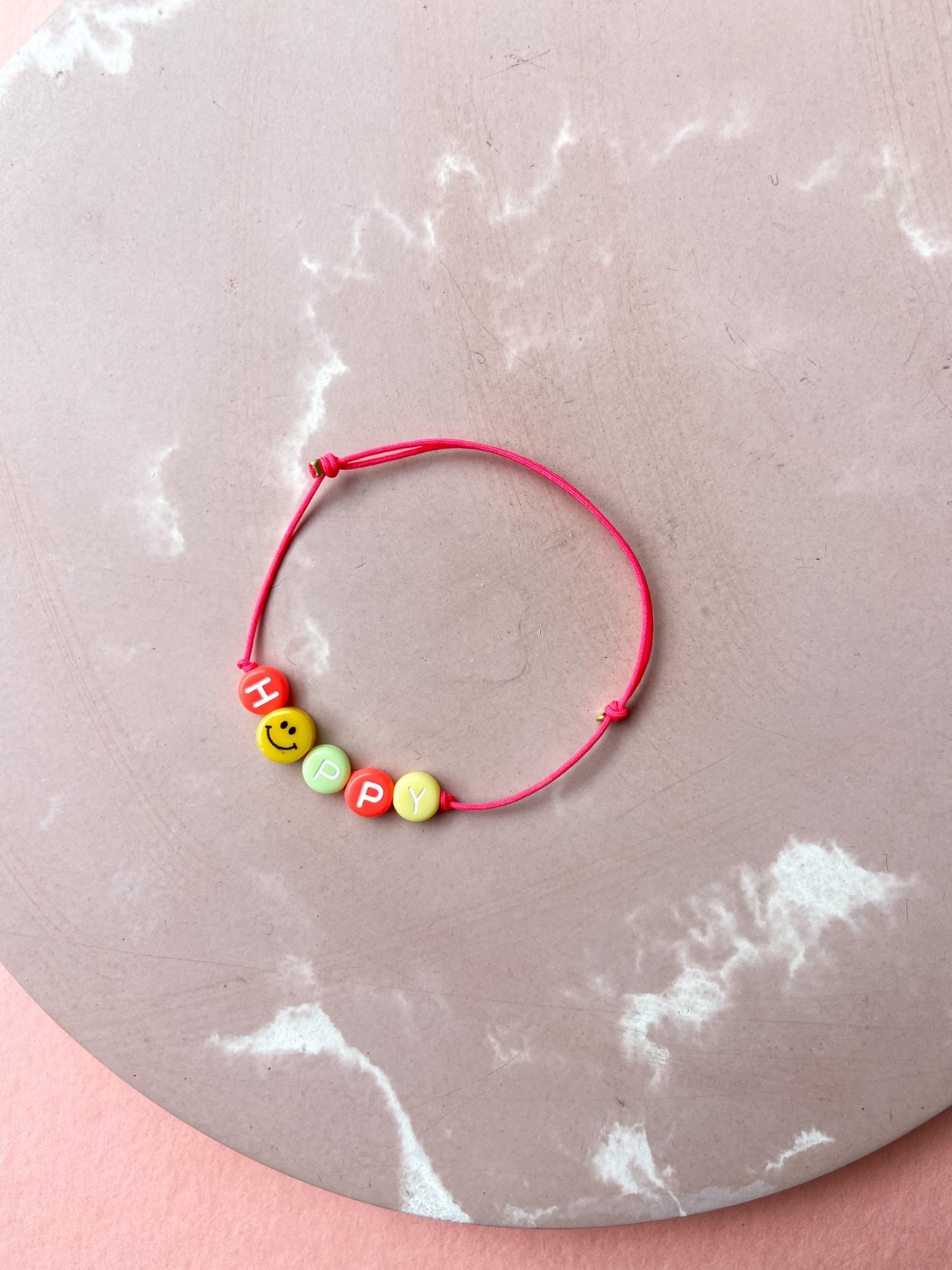 tinchens - Armband H A P P Y - pink