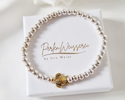 Armband aus Edelstahlperlen - elastisch | goldene Schildkröte | silberme Perlen
